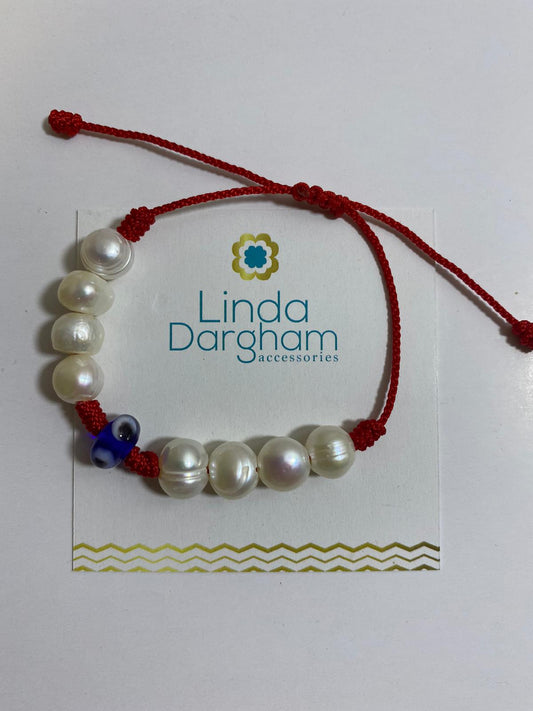 pulsera de perla con ojo